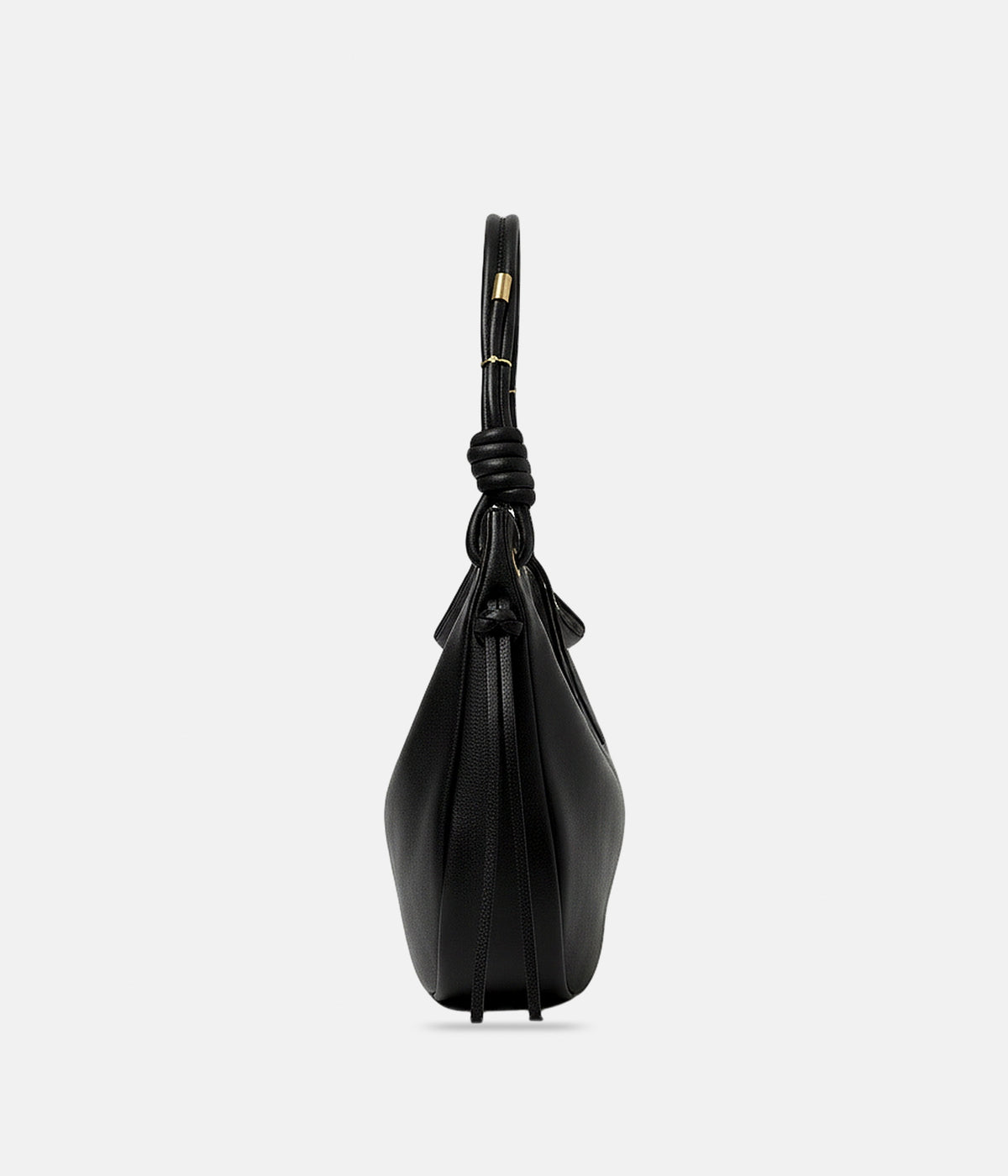 Sac Astrid noir AUNE — vue de profil, liens de cuir le long du flanc et anse à embouts de laiton — AUNE